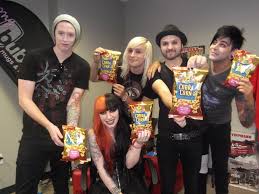 The Members Of New Years Day Enjoy Cobra Corn At The Backstage Artists Lounge New Year S Day Corn Cobra