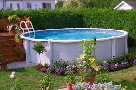 17 Ways To Pretty Up An Above Ground Pool Backyard Pool Landscaping Small Above Ground Pool Backyard Pool