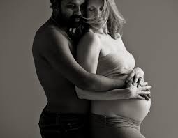 A great angle for maternity photo poses to demonstrate a round tummy and a pregnant woman in all her beauty. Western Massachusetts Fine Art Portrait Photography Of Maternity Newborns Children And Family
