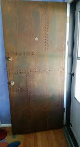 metal effects patina on front door project by colleen huigen murphy steampunk door metal door industrial door