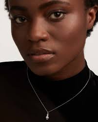 Sterling silver necklace with a robot pendant