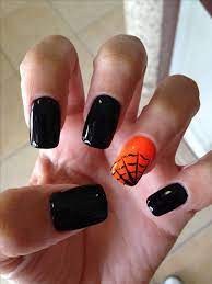 October is a busy month in terms of breast cancer awareness, halloween, and the several fun activities that fall weather brings with it. October Nails Nailshalloween Nails Cute Halloween Nails Halloween Nail Designs October Nails