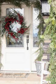 This patented garland hanger allows you to hang garland around your front door without damaging your home with nails or screws. How To Make A Garland Frame Your Front Door The Wood Grain Cottage
