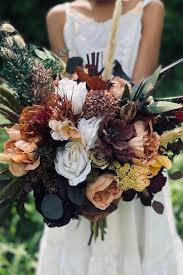 This beautiful fall bouquet is filled with colour! 30 Best Fall Wedding Bouquets Autumn Bridal Bouquets
