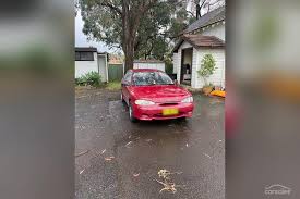 Image result for Cardinal Red 1999 Hyundai