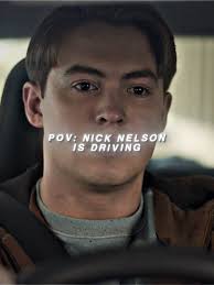 Nelson Driving A Car