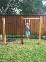 I've been planning some type of swingset, but couldn't decide whether to buy a kit or stickbuild. Backyard Jungle Gym Bars Without Concrete House Homemade