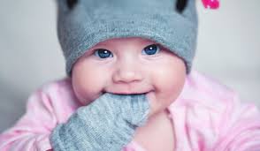 Tadhg Fleming's baby girl watches him in football match