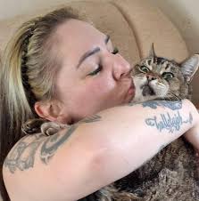 THIS CAT IS G R O M P Y