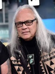 What songs did Rickey Medlocke write and provide lead vocals for