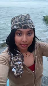 Black Girl Singing Waves in The Water around by White Girls