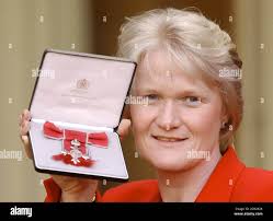 With his mbe at buckingham palace hi-res stock photography and images