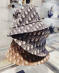 732 Likes 2 Comments Black Box Concierge Blackboxconcierge On Instagram Summer Staple Dior Fashion Silk Wedding Dress Simple Dior Bucket Hat