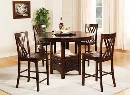 Your very own spinning buffet. Claire Lazy Susan Storage Base 5 Piece Counter Height Dining Set In Espresso Finish By Coaster 101588