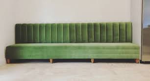 recovered interior green channel tufted banquette in 2021 dining room banquette green dining room dining room seating