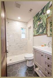 Corrugated metal sheet walls ,concrete floor and an old bathtub make this a charming bathroom. 12 Inspiring Walk In Showers For Small Bathrooms Houzz Small Bathrooms Small Bathroom Reno Up Restroom Remodel Small Bathroom Renos Bathroom Design Small