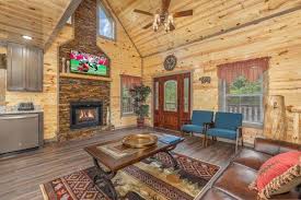 Condos are located in pigeon forge with amenities like outdoor pools, saunas, hot tubs, tennis courts and a lazy river. Alpine Adventure Luxury Plus 4 Bedroom Pigeon Forge Cabin Rental Pigeon Forge Cabin Rentals Pigeon Forge Cabins Cabins In The Smokies