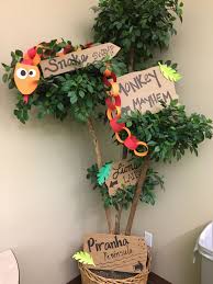 Another great idea is buying lots of monkey themed baby clothes and using them in the the monkey theme allows for the use of many plants making the party look a bit like a jungle. Jungle Safari Adventure Happy Birthday Banner Party Hanging Decoration Monkey Ey Greeting Cards Party Supply Home Garden