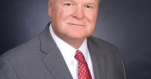 Putney retires from banking