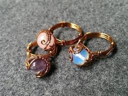 A hole is drilled in the center of the disk and then it is expanded with a ball frazer. Tutorial Rings With Spherical Stones How To Make Wire Jewelery Ringsdiyhandmade Wire Jewelry Wire Jewelry Rings Wire Jewelery