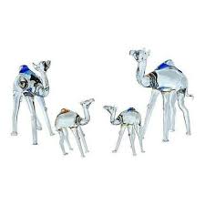 There are two extant species of camels, the dromedary or arabian camel, camelus dromedarius, which has a single hump. Camel Family Set Glass Statue For Home Decoration Rs 100 Pair Id 20847527133