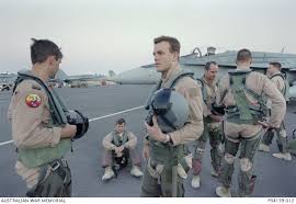 Both pilots ejected successfully and the aircraft ended up in grass. F A 18 Hornet Pilots From 75 Squadron Raaf Gather On The Tarmac At Al Udeid Airbase After Australian War Memorial