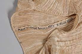 Fortuny pleats apron top in black. A Love Letter To Mariano Fortuny S Delphos Gown 1 Granary