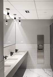 Define a beautiful style in your bathroom guided by this modern & contemporary concept from bathrooms. Public Washroom Studio Alyse Office Bathroom Design Commercial Bathroom Designs Restroom Design