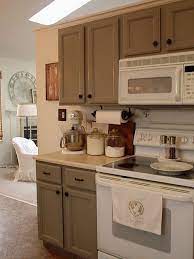 Grey Cabinets And White Appliances Finally A Cute Kitchen With Somethi Kitchen Cabinets With Black Appliances White Kitchen Appliances Brown Kitchen Cabinets