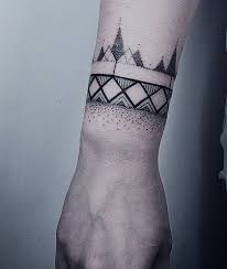6 Perfect Wrist Tattoos Gettattoed Com Geometric Tattoo Wrist Tattoos For Guys Small Wrist Tattoos