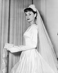 Meghan Markle S Givenchy Wedding Dress Is Very Audrey Hepburn Audrey Hepburn Wedding Audrey Hepburn Photos Audrey Hepburn