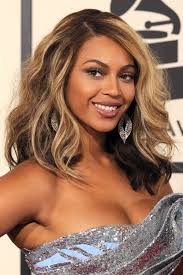 In this photo, beyonce teases her blonde hair back into a low ponytail. 48 Beyonce Hairstyles Through The Years