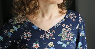 Pin & sew unfolded edge of binding to neckline. How To Convert Any Pattern To A V Neck Blog Oliver S