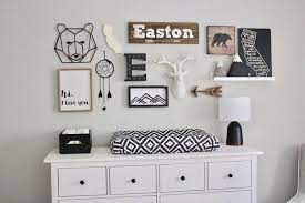Nursery In Nagykovacsi A Modern Nursery With Archetypical Form Of Rural Houses Adorable Nursery Nursery Room Decor White Home Decor