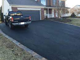 This concept offsets a beautiful brick home with bright, lush greenery that's. Tar Chip Driveways In Frederick Md By Driveways 2day