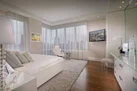 Stylish guest suite with private deck. How To Decorate A Bedroom With White Walls