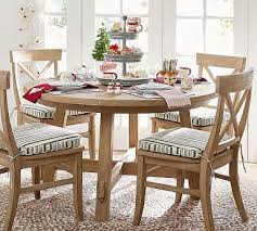 It's crafted with a distressed top and eased edges, and designed to maximize legroom and serving space. Toscana Round Extending Dining Table Christmas Dining Table Dining Table Decor Christmas Dining Table Decor