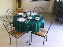 The materials of your table can influence the overall feel. Breakfast Table One Of Many Dining Areas There Is Also A Large Formal Dining Room Picture Of The Villa Tievoli Merida Tripadvisor