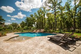 Not to mention, by adding simple landscaping and a set of low maintenance waterproof patio furniture, you can enjoy turn your pool into your very own tropical retreat. Custom Pool Designs Creating Your Own Backyard Oasis