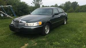 Image result for Charcoal Green 1999 Town Car