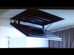 Using a tv mount for screens whose measurements go beyond what the manufacturer recommends is not a good idea. Motorized Flip Down Flat Screen Tv Ceiling Mount Youtube