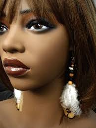 Trinity Feathers in Earth Colors, Browns, Blacks, White, Grays. Two  Anointed Lava Beads, and an Olive Wood Bead From Bethlehem. 5.5