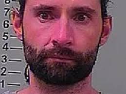 Home invasion suspect out of hospital, in jail