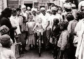 Black And White Crowd Photography This Picture Is From The Early 1960s And Shows My Dad The Baby On A Bike Surrounded By A Crowd Black And White Photographs Light In The Dark Yemeni People