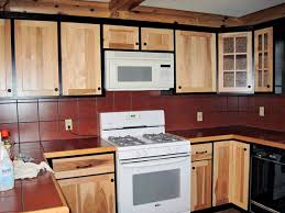 We painted our yellow oak cabinets from the 90's white and changed the whole look of our kitchen. Diy Easy Kitchen Makeover