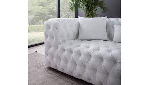 You may also be wondering how durable a leather sofa is. Cosima Deep Tufted White Leather Sofa
