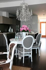 Crystal Chandelier In The Kitchen Eclectic Dining Room Dining Room Design Pedestal Dining Table