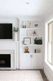 Create a buzz with our extraordinary tv media centres; White Built Ins Around The Fireplace Before And After The Diy Playbook