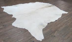 Don't wait until you spill coffee or drop pasta sauce on your rug to clean it! Large Cowhide Rug In Plain White Made With 100 Premium Etsy