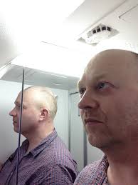 Self Portrait in Airplane Bathroom